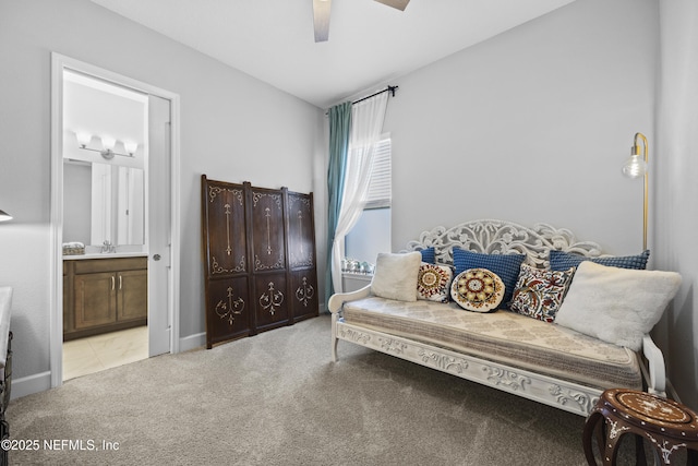 living area with ceiling fan, light colored carpet, and vaulted ceiling