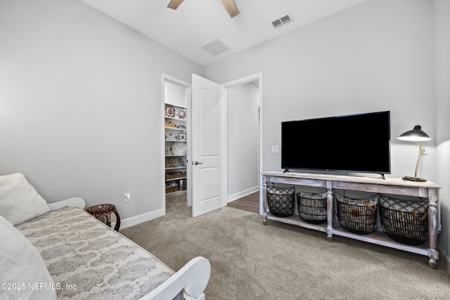 interior space featuring ceiling fan