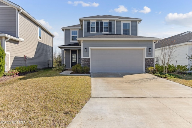 view of front property with a garage and a front yard