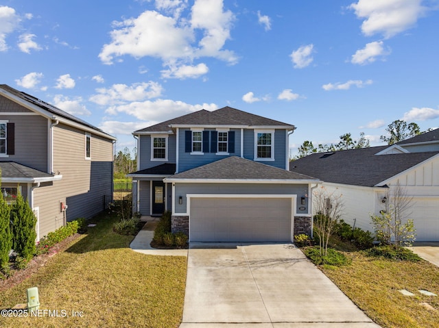 front facade featuring a front lawn and a garage