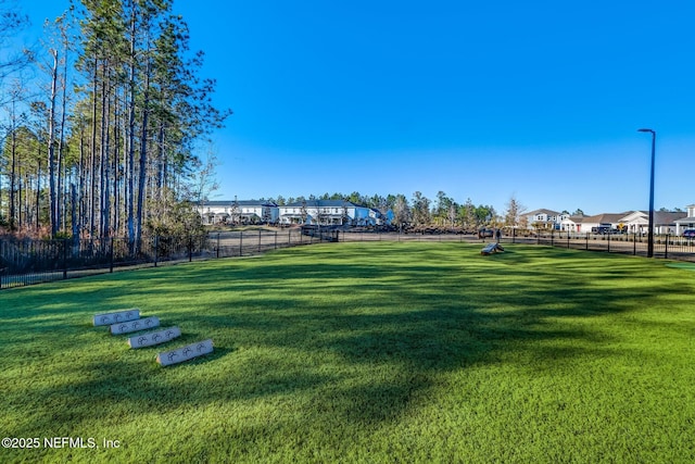 view of community with a lawn