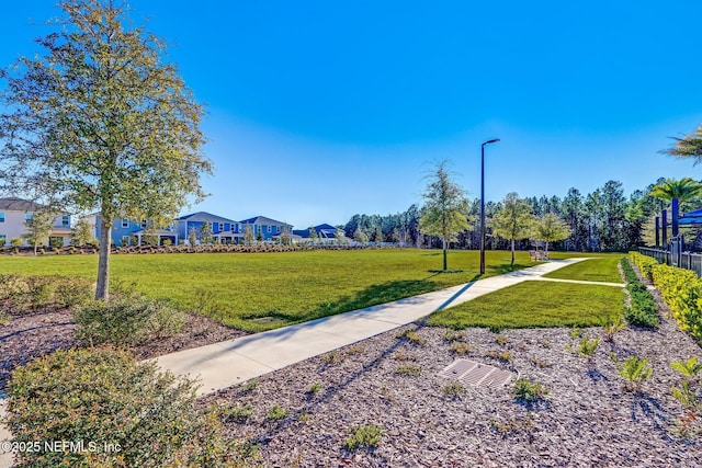 surrounding community with a lawn