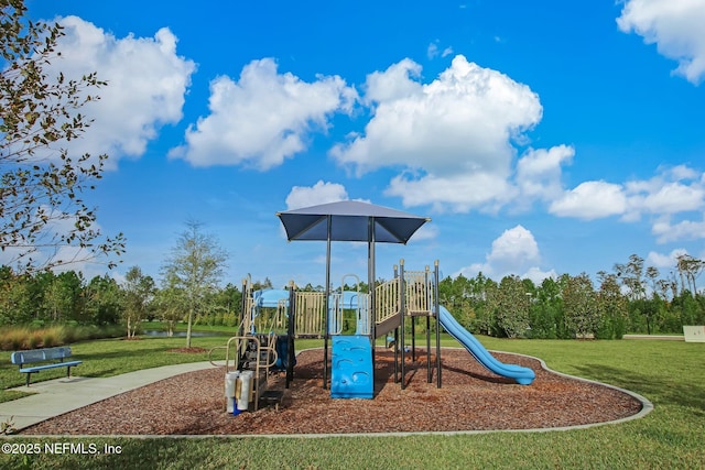 view of jungle gym with a lawn