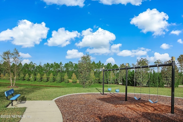 view of play area featuring a lawn