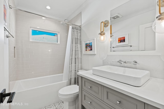 full bathroom featuring vanity, toilet, and shower / bathtub combination with curtain