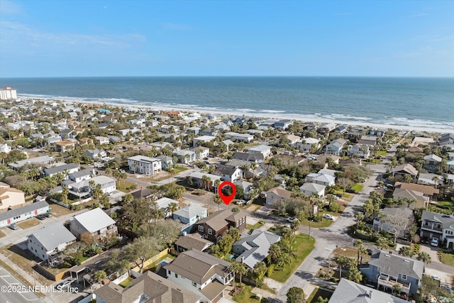 aerial view with a beach view and a water view