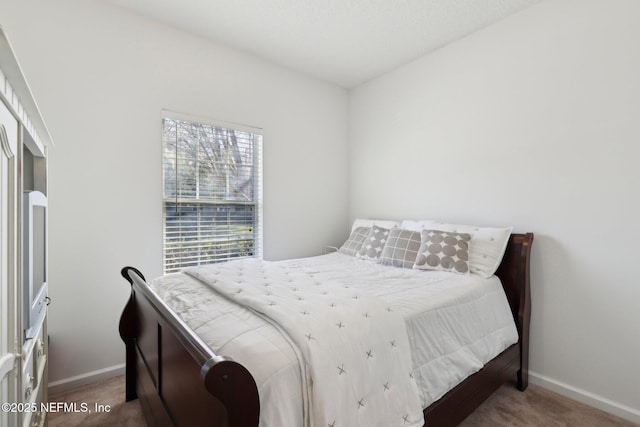 bedroom featuring carpet