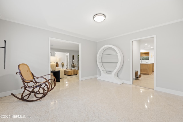 sitting room with crown molding