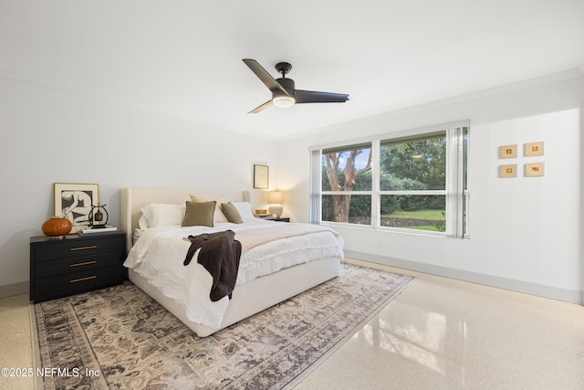 bedroom featuring ceiling fan and crown molding