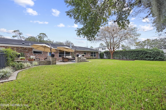 view of yard featuring a patio area and an outdoor living space