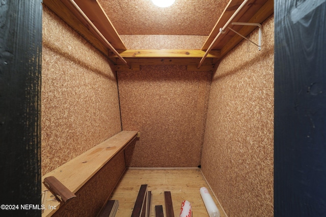 walk in closet featuring hardwood / wood-style floors