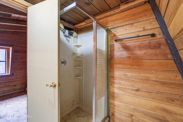 bathroom featuring wood walls and wood ceiling