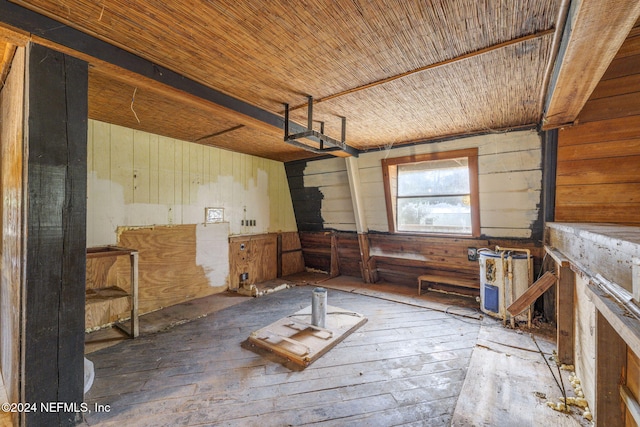 misc room featuring wood walls and wood ceiling