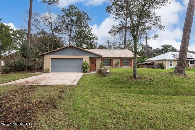 single story home featuring a front yard and a garage