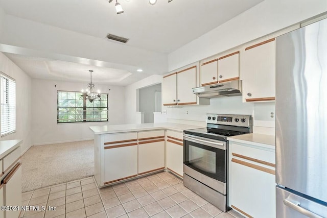 kitchen featuring stainless steel appliances, kitchen peninsula, a chandelier, pendant lighting, and light colored carpet