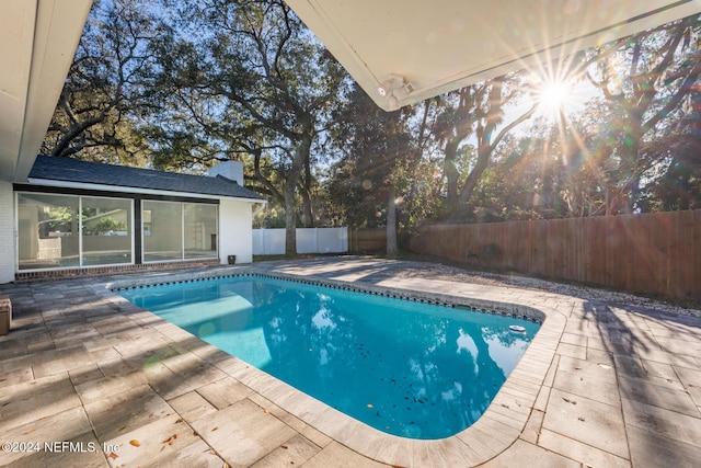 view of pool with a patio