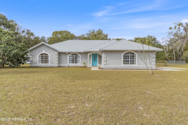 ranch-style house with a front lawn