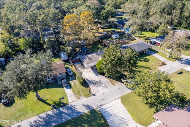 birds eye view of property with a residential view