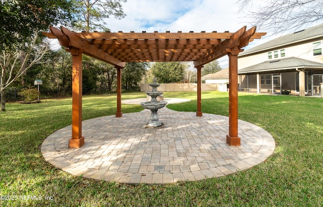 view of patio / terrace with a pergola and a sunroom