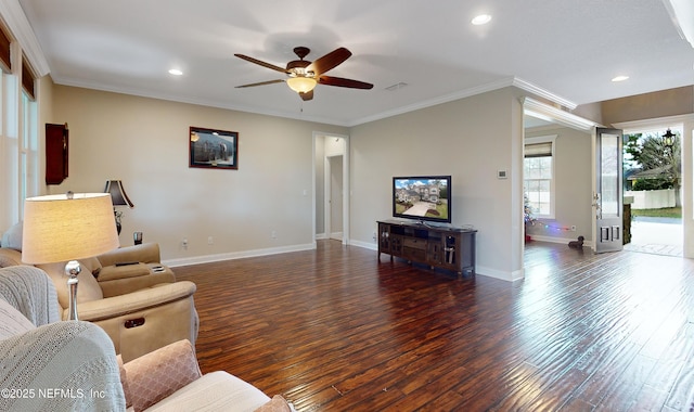 living room featuring ceiling fan, crown molding, and dark wood-type flooring