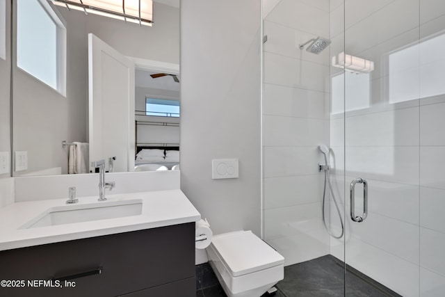 bathroom featuring vanity and an enclosed shower