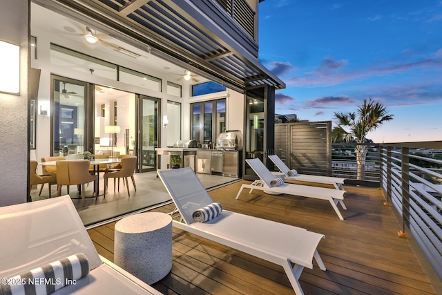 view of deck at dusk