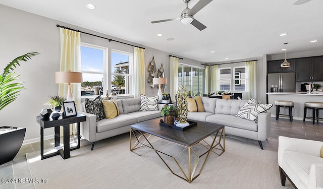 living room featuring ceiling fan