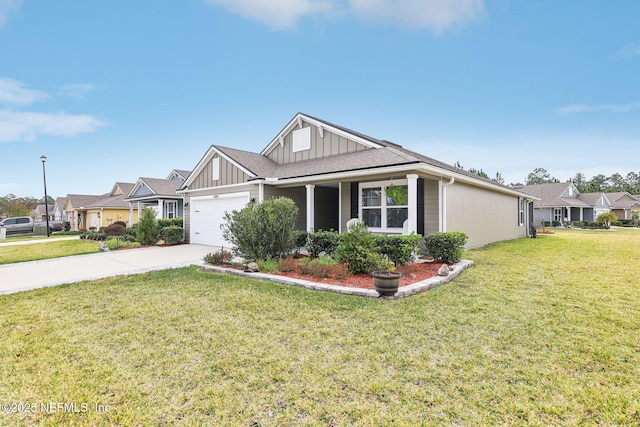 view of front facade featuring a garage and a front lawn