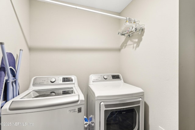 laundry room with washer and dryer