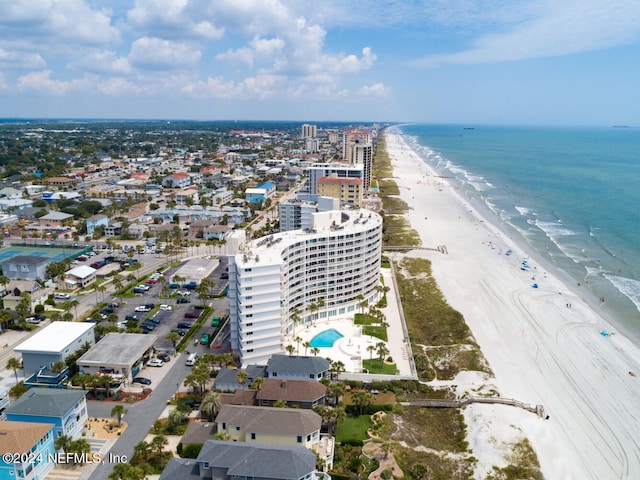 bird's eye view with a beach view and a water view