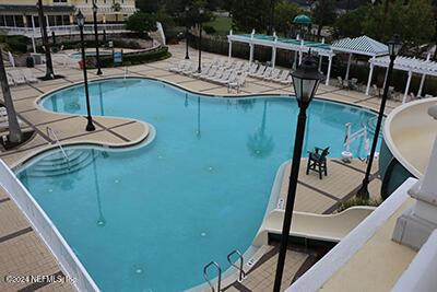 view of swimming pool featuring a patio