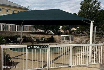 view of swimming pool with a gazebo