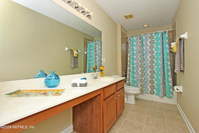 full bathroom with shower / tub combo, tile patterned flooring, vanity, a textured ceiling, and toilet