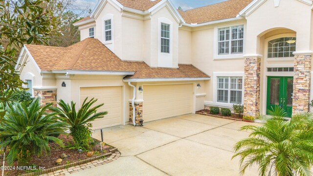 view of front of property featuring a garage