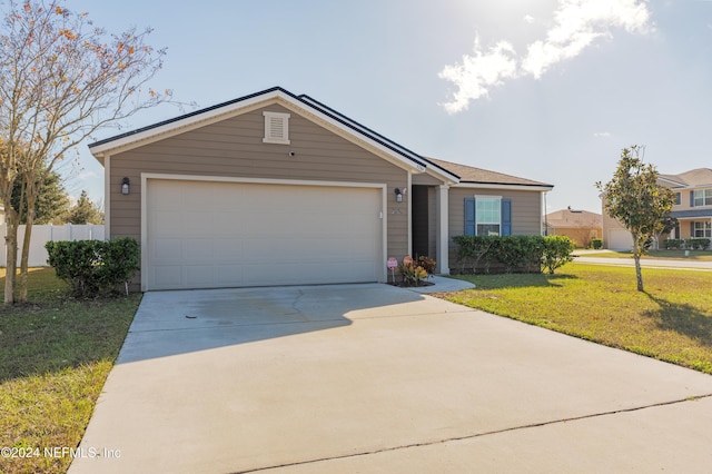 ranch-style house featuring a front lawn