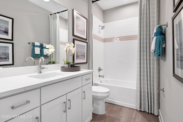 full bathroom with vanity, shower / bath combination with curtain, toilet, and wood-type flooring