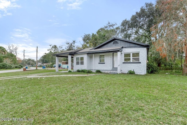 view of front of home with a front yard