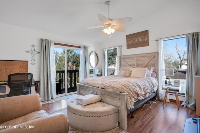 bedroom featuring hardwood / wood-style floors, access to outside, ceiling fan, and lofted ceiling