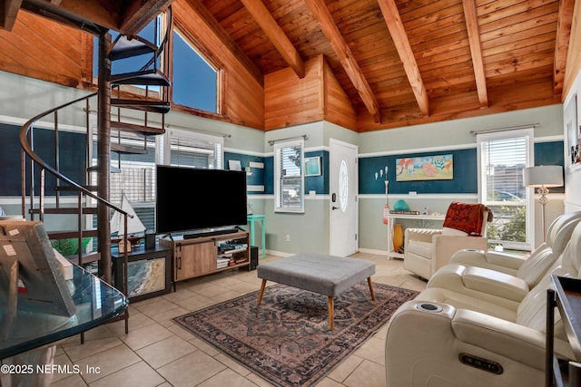 tiled living room featuring beam ceiling, wooden ceiling, and high vaulted ceiling