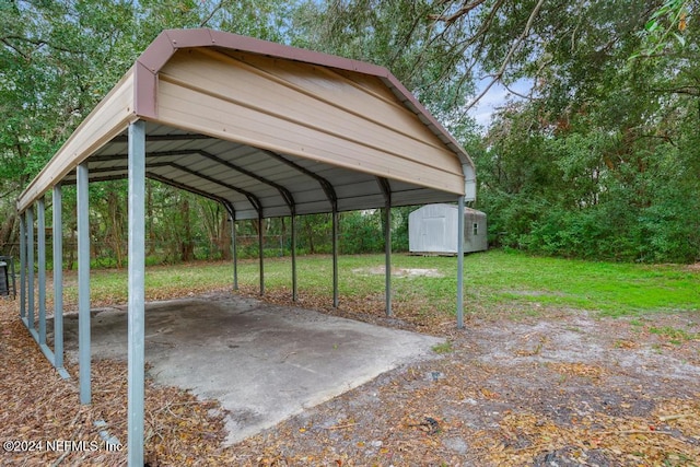 view of parking featuring a lawn and a carport