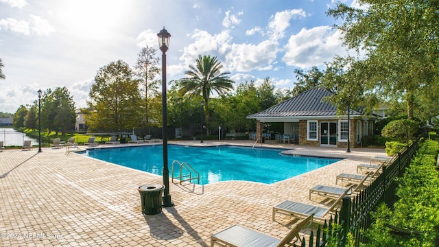 view of pool featuring a patio