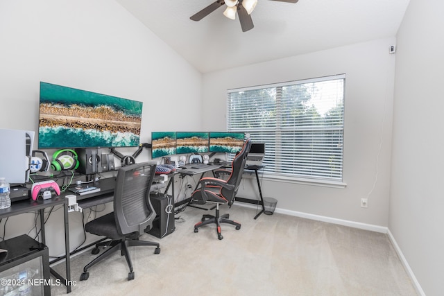 home office with carpet, ceiling fan, and lofted ceiling