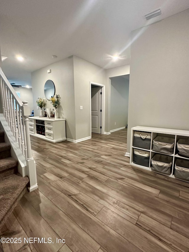 interior space with hardwood / wood-style flooring