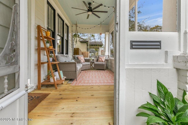 exterior space with ceiling fan