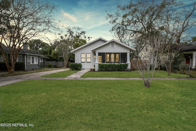 view of front of house with a yard