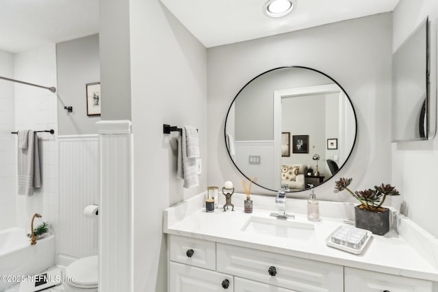 full bathroom featuring vanity,  shower combination, and toilet