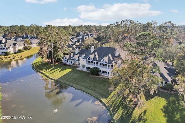 bird's eye view with a water view