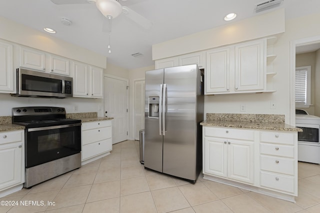 kitchen with washer / dryer, white cabinetry, ceiling fan, and appliances with stainless steel finishes