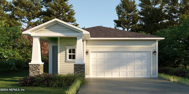 view of front of property with a garage