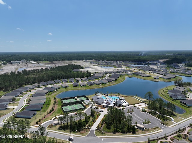 birds eye view of property featuring a water view and a residential view